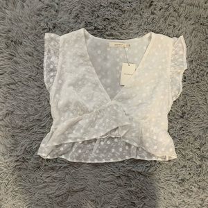 Brand New, with Tags Never Worn Idem Ditto Eyelet Butterfly Top. Size: Medium